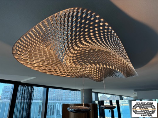 Luminaire en forme de vague